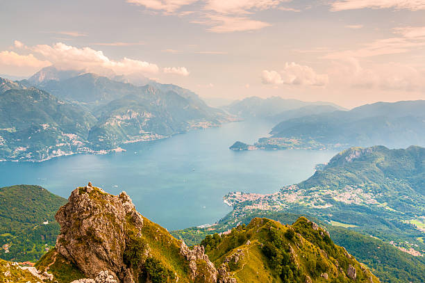 Panoramic view of Lago di Como Panoramic view of Lago di Como in Northern Italy. italian lake district photos stock pictures, royalty-free photos & images