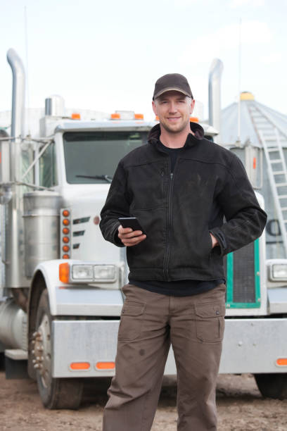 istock Truck Driver with Smartphone 155598763