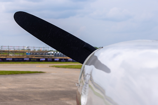 Views of a small private grass airstrip in Marstons Mills on Cape Cod in MA.  Many small planes are on the ground including several DC3s.  All runways for this airstrip are grass.