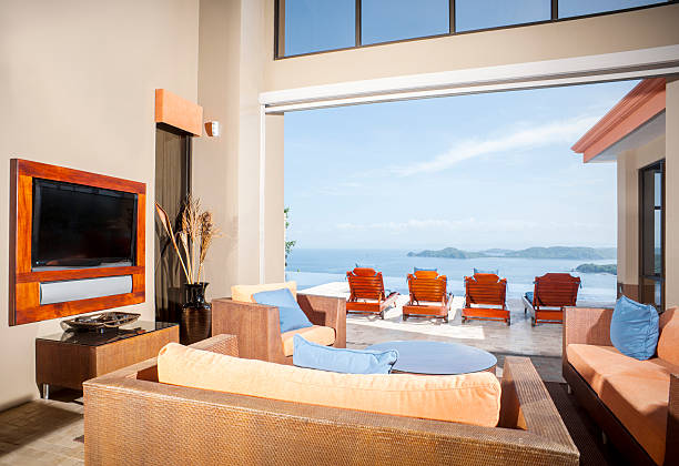 istock Luxury tropical home overlooking to ocean 155599064