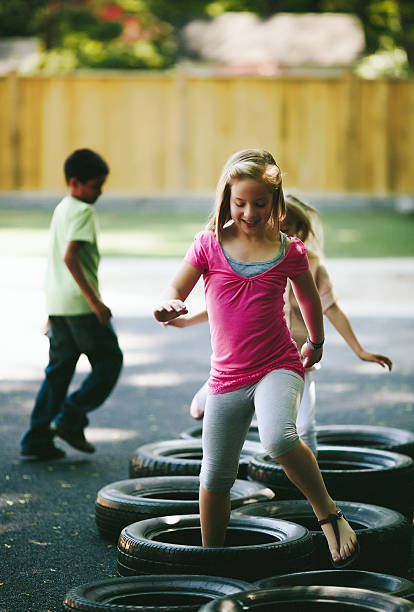 istock children playing outdoors 155599240