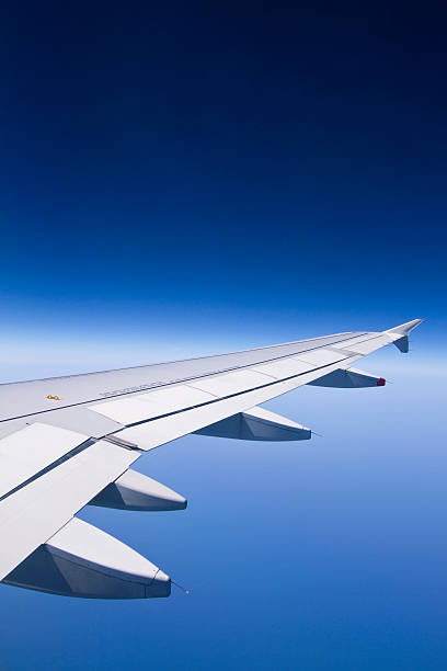 istock Commercial airplane wing at high altitude 155599266