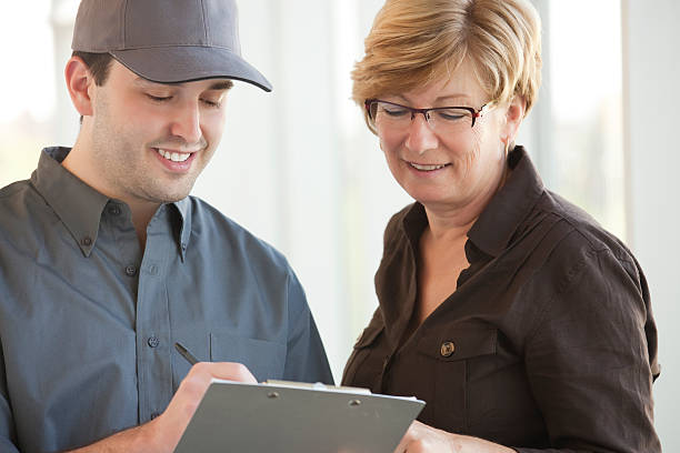 Service Personnel with a Customer stock photo