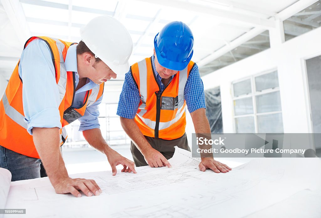 Keeping to the plans  Adult Stock Photo