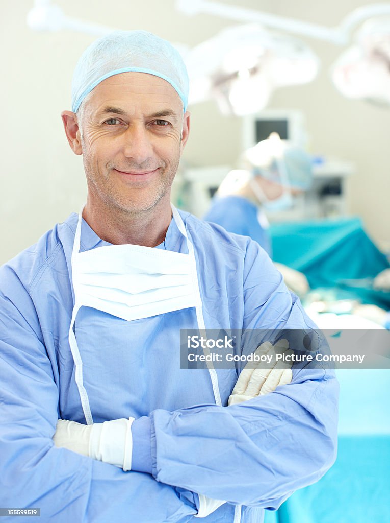 Salvando vidas com um sorriso - Foto de stock de Cirurgião royalty-free