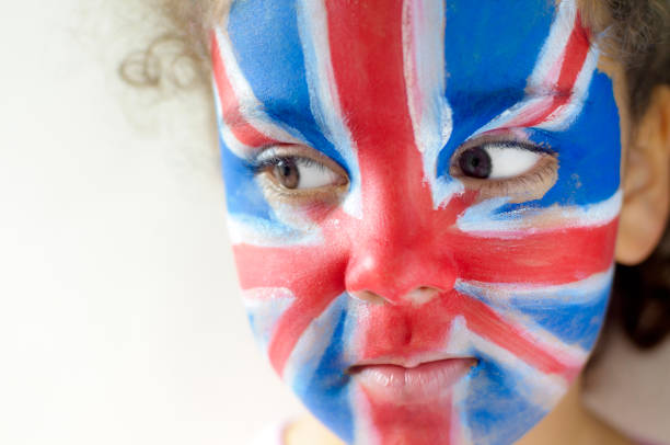 istock Smiling Girl (5-6) With Union Jack Face Painted 155599661