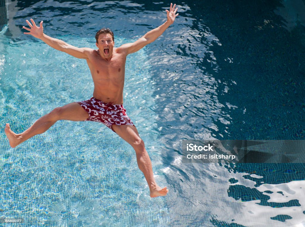 Salto en piscina - Foto de stock de Agua libre de derechos