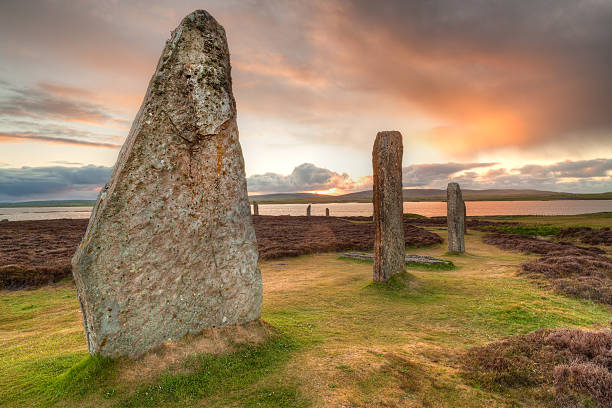 Ring of Brodgar ancient stones, Orkney Part of the Neolithic stone circle known as the Ring of Brodgar, on the Orkney Islands of Scotland just after dawn. The site dates back to between 2500BC to 2000BC and is part of a wider archaeological complex containing Skara Brae, the Stones of Stenness and Maeshowe. orkney islands stock pictures, royalty-free photos & images