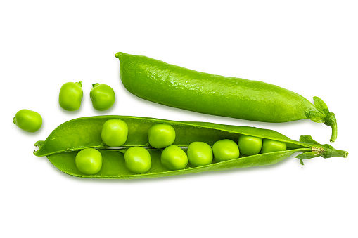 Fresh green peas in a pod isolated on a white background.
