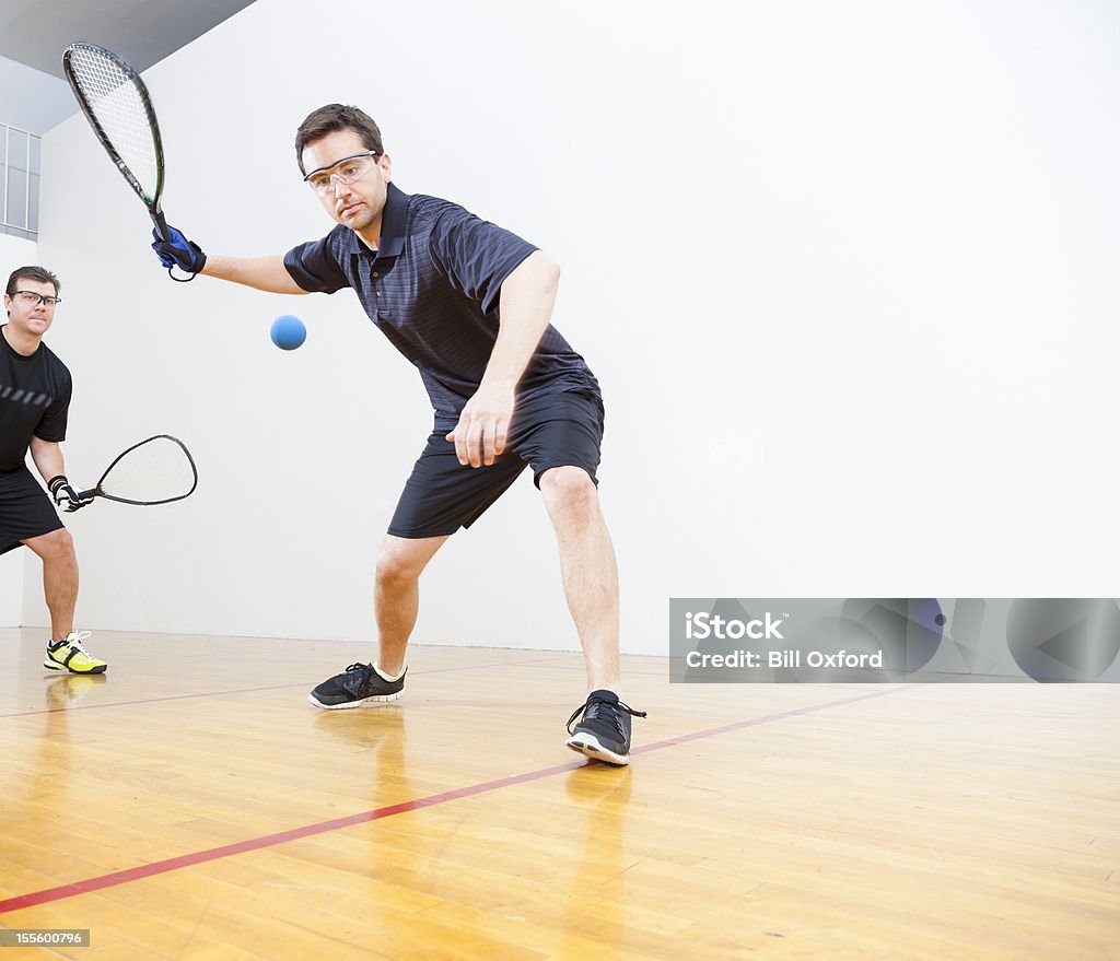 Hombres jugando al Racquetball - Foto de stock de Squash libre de derechos