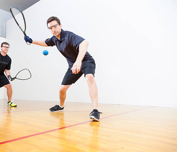 Men Playing Racquetball