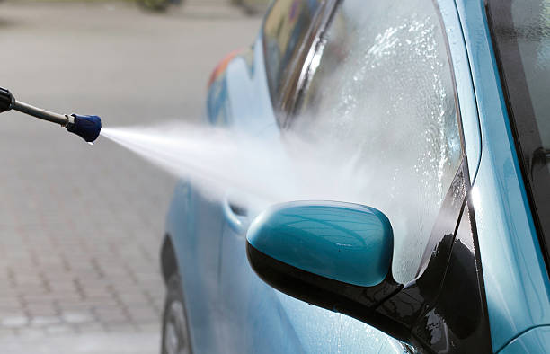 istock Car wash with high pressur cleaner 155601213
