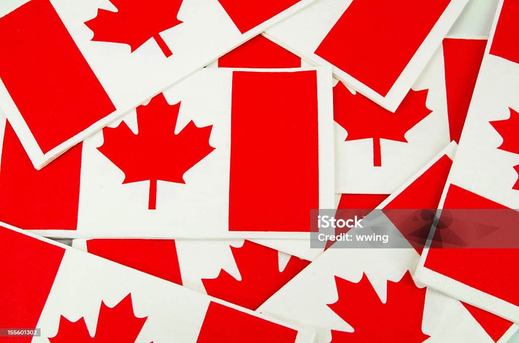 Canadian Flags-  Background Many napkins made to look like Canada's flag... the Maple Leaf. Good Canada Day background. Backgrounds Stock Photo