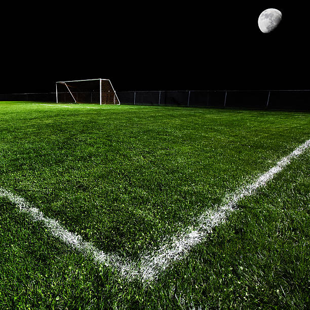 istock Soccer Field at Night 155601395