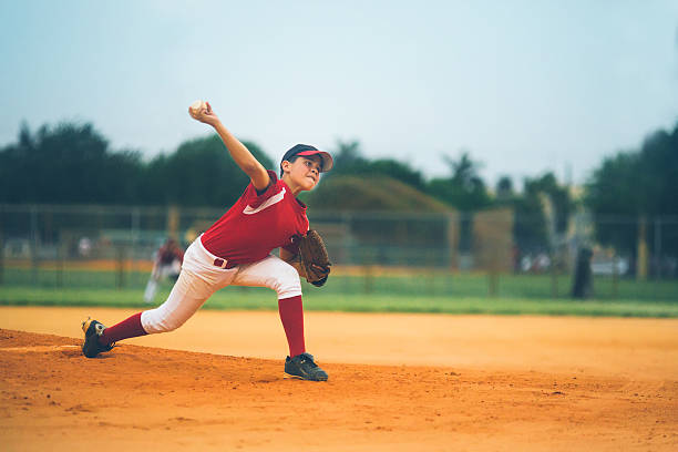 young baseball league pitcher  baseball uniform photos stock pictures, royalty-free photos & images
