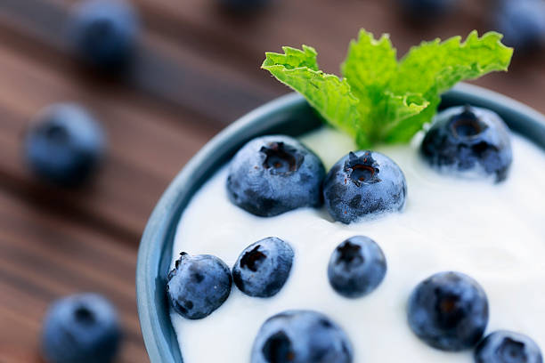 Vanilla-flavored Greek yogurt topped with fresh blueberries.\n\n[url=http://bit.ly/tW3vHT][img]http://nicolesyoung.com/istock/lightboxes/food_breakfast.png[/img][/url]\n[url=http://bit.ly/tTExPP][img]http://nicolesyoung.com/istock/lightboxes/food_fruitveggy.png[/img][/url]\n[url=http://bit.ly/uV6bk8][img]http://nicolesyoung.com/istock/lightboxes/food.png[/img][/url]