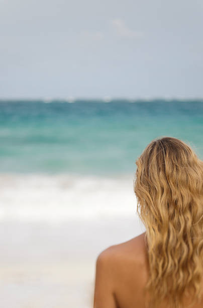 istock Woman on beach 155601958