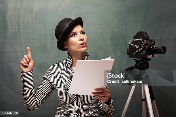 Portrait Of Actress Reading Script Behind Camera Stock Photo - Download Image Now - Film Reel, Auto Post Production Filter, Actress