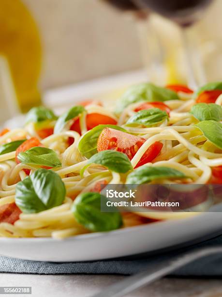 Pasta With Fresh Basil And Tomatoes Stock Photo - Download Image Now - Basil, Bowl, Cherry Tomato