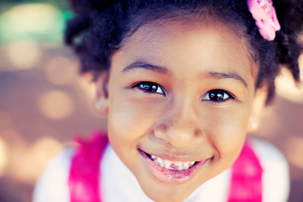 istock African American Girl Looking at Camera 155602531