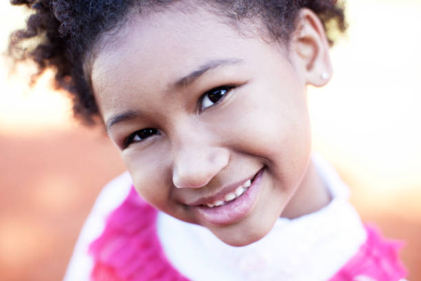 istock African American Girl Looking at Camera 155602552