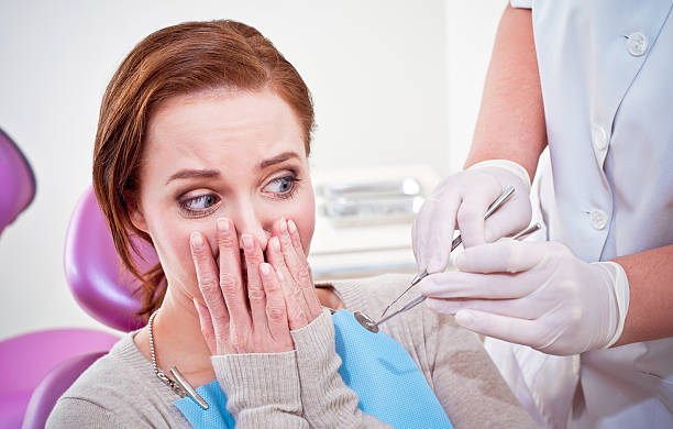badanie dentystyczne niepokój - ishealth2012 zdjęcia i obrazy z banku zdjęć