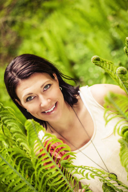 istock Beautiful brunette enjoying nature 155602735