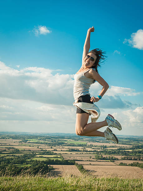 istock Asian Women jumping in the air 155602841