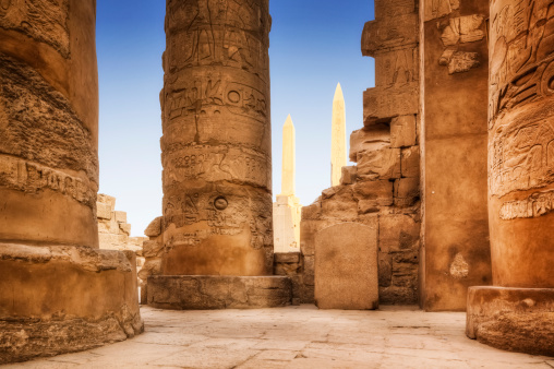 Great Hypostyle Hall, columns with ancient carvings, Karnak Temple, Luxor, Egypt.