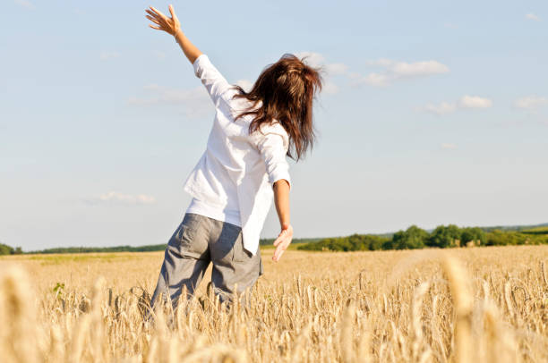 istock Happy woman in a cornfield 155602993