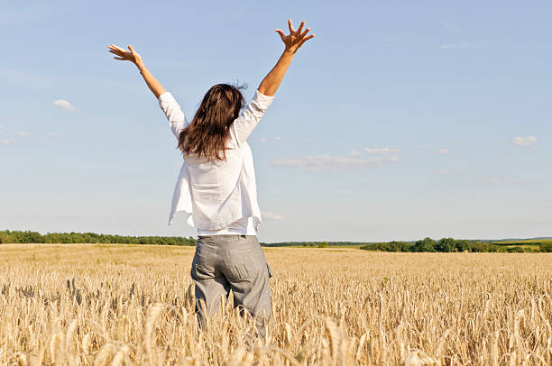 istock Happy woman in the summer field 155602999