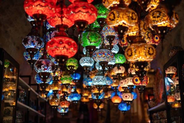 istock Oriental colorful glass hanging lamps or lanterns in turkish bazaar 1556055978