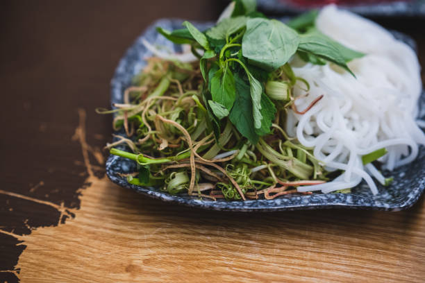 Bun Bo Hue, Bun Bo, Vietnamese beef noodle soup spicy in stone bowl