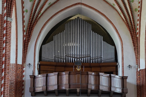 Choir and organ in the medieval gothic Basilica of the Holy Trinity in Chelmza