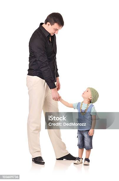 Handshake Of Man And Boy Stock Photo - Download Image Now - Tall - High, Tall Person, Short Person