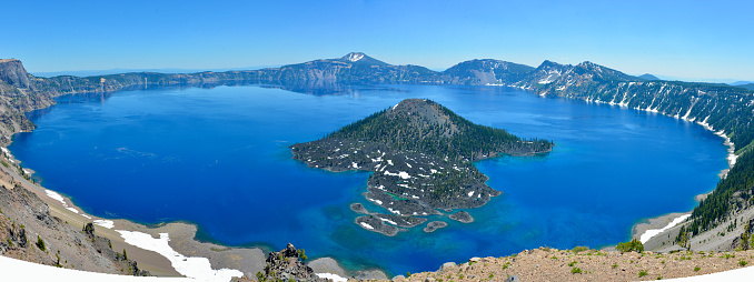 Crater Lake is a beautiful body of water in Southern Oregon. In an alpine setting, the lake is over 5 miles in diameter.