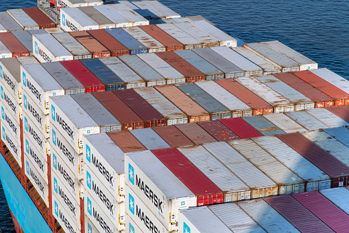 Rotterdam, the Netherlands-April 27, 2023; High angle view of the stacked containers on a large Maersk containership