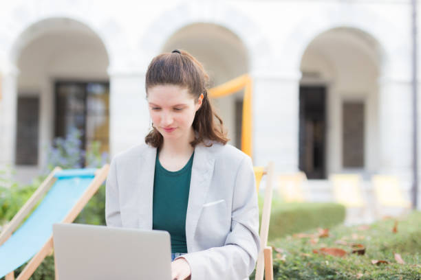 istock student typing on their laptop on campus 1556141814