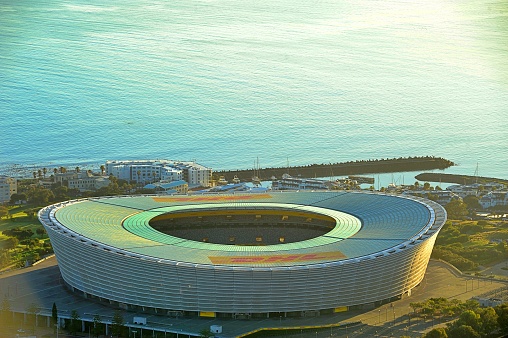 The Cape Town Sports Stadium from the top of the mountain during sunrise.