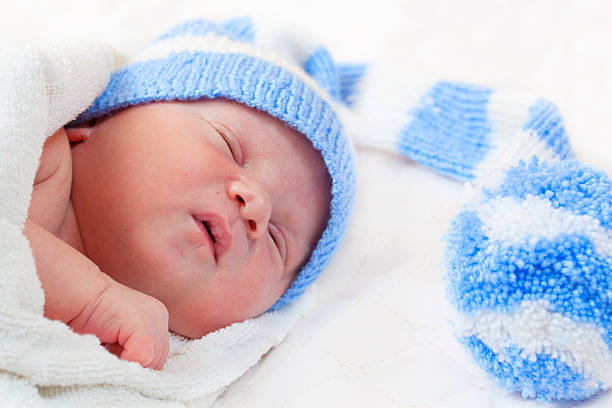 istock newborn baby (at the age of 7 days) 155617511