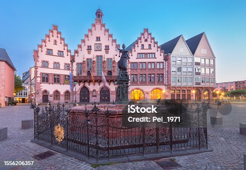 istock Old medieval houses on the market square in Frankfurt am Main at dawn. 1556206357