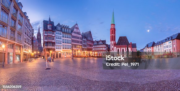 istock Old medieval houses on the market square in Frankfurt am Main at dawn. 1556206359