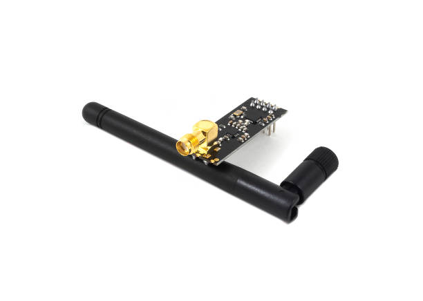 istock Wi Fi development board with antenna isolated on a white background. Learning board for Internet of things project. IOT concept. Device control technology through the network system 1556227470