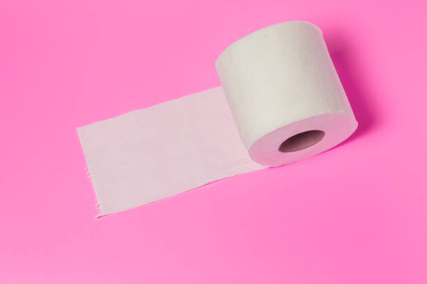 istock toilet paper roll on pink 1556255119
