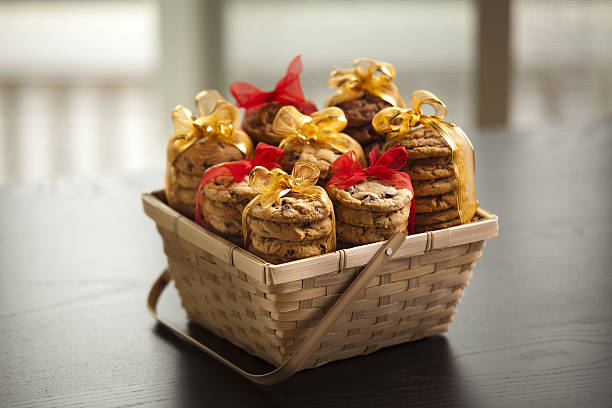 A gift basket of assorted cookies tied with ribbons.