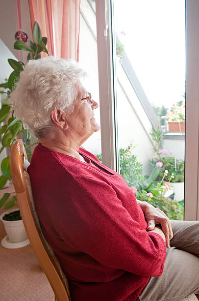 istock lonely old woman 155630280