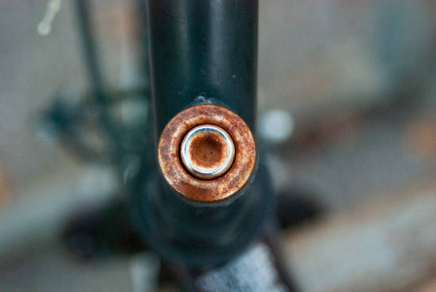 istock Closeup Texture of Rusted Bike Connection 1556324687