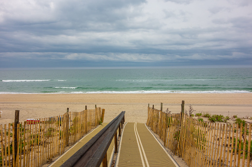 Atlantic ocean beach view from on top of a sand dune in Beach Haven, New Jersey.