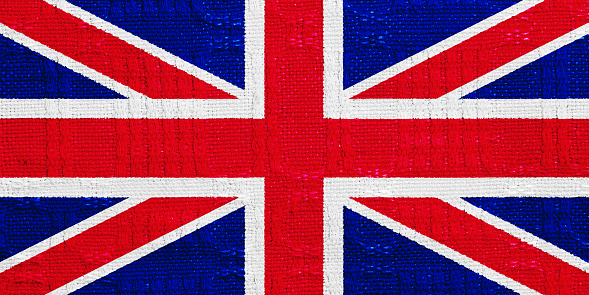 Flag of Great Britain on a textured background. Concept collage.