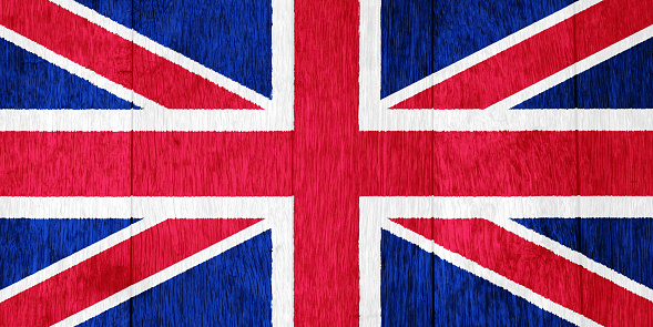 Flag of Great Britain on a textured background. Concept collage.